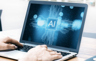 Man typing on laptop where AI image is pictured on the screen to symbolize the program ChatGPT