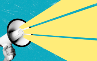 a white megaphone being held by a hand with an illustrated yellow beam coming out of it